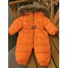Помаранчовий зимовий комбінезон на пуху уні