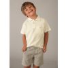 Біле поло з карманом для хлопчика